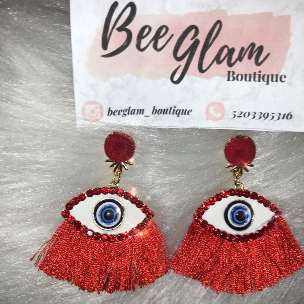 Red eye tassel earings ❣️❣️